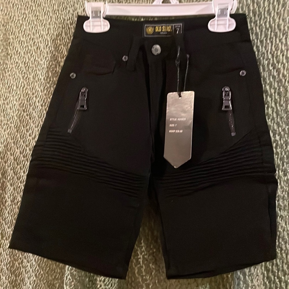 Two pairs of boys shorts size 7. One black and one grey.